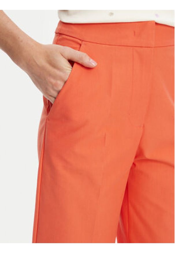United Colors of Benetton - United Colors Of Benetton Spodnie materiałowe 42A8DF08R Pomarańczowy Wide Leg. Kolor: pomarańczowy. Materiał: bawełna