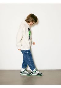 Reserved - Jeansy jogger - niebieski. Kolor: niebieski #1