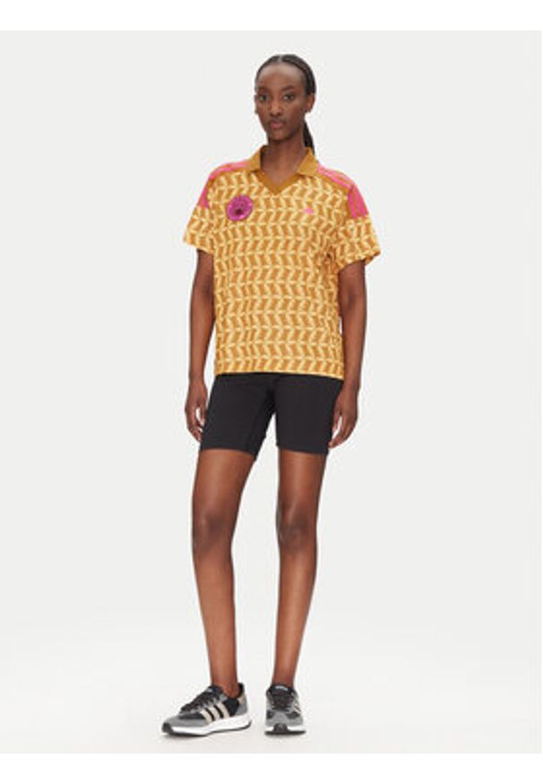 Adidas - adidas T-Shirt FARM Rio JD6303 Pomarańczowy Loose Fit. Kolor: pomarańczowy. Materiał: syntetyk