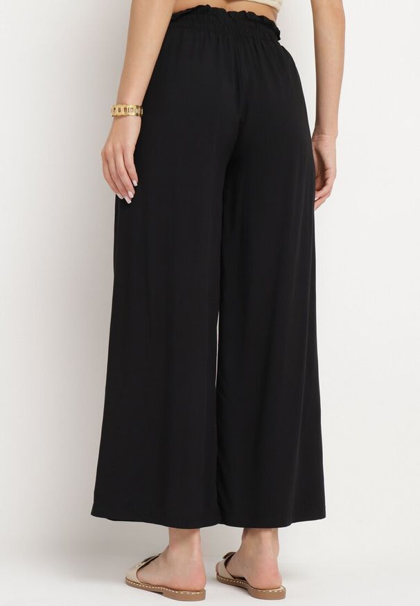 Born2be - Czarne Szerokie Bawełniane Spodnie Palazzo z Wysokim Stanem i Elastyczną Gumką w Pasie Nelonia. Okazja: na co dzień. Stan: podwyższony. Kolor: czarny. Materiał: bawełna. Sezon: lato. Styl: casual, elegancki, wizytowy