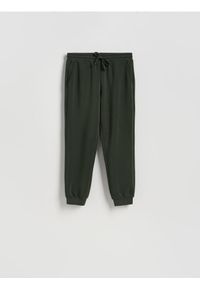 Reserved - Joggery z modalem - ciemnozielony. Kolor: zielony. Materiał: dzianina