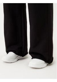 Hugo - HUGO Spodnie dresowe 50522435 Czarny Relaxed Fit. Kolor: czarny. Materiał: bawełna #5