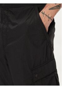 GAP - Gap Spodnie materiałowe 487058-00 Czarny Relaxed Fit. Kolor: czarny. Materiał: syntetyk #3