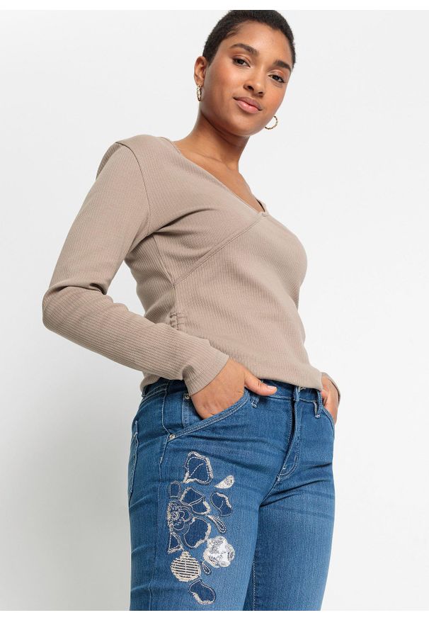 bonprix - Dżinsy dzwony z kwiatowym haftem. Kolor: niebieski. Wzór: haft, kwiaty