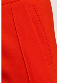 Calvin Klein Jeans - Spodnie. Stan: podwyższony. Kolor: czerwony. Materiał: bawełna, poliester, dzianina. Wzór: nadruk, gładki #5