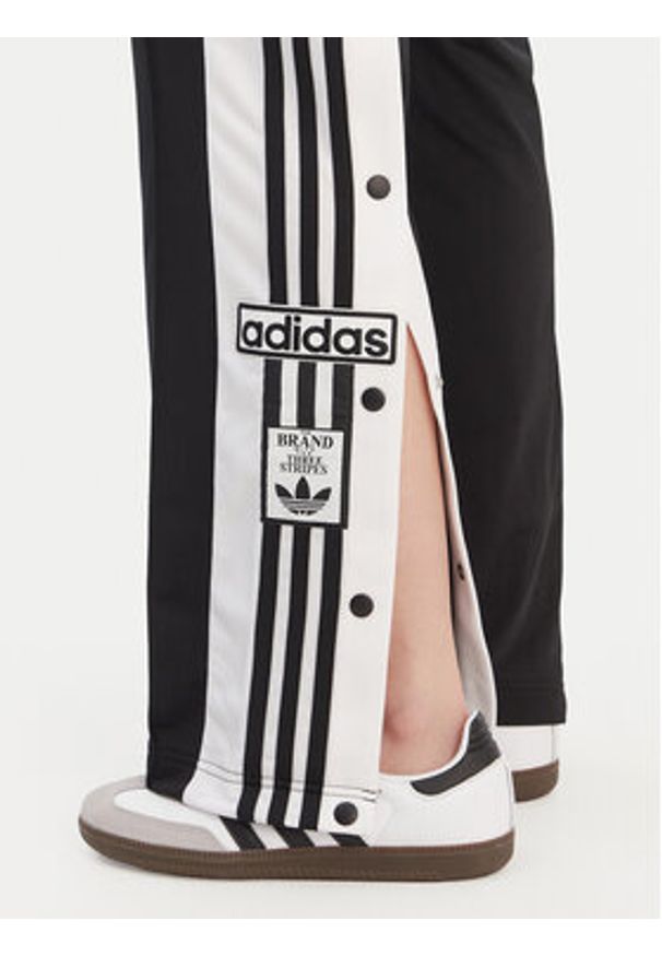 Adidas - adidas Spodnie dresowe Adibreak KD2932 Czarny Loose Fit. Kolor: czarny. Materiał: syntetyk