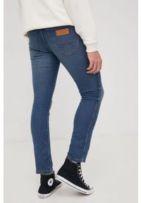 Wrangler jeansy LARSTON GREEN TWIST męskie. Kolor: niebieski #2