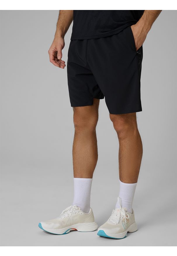 4f - 4F Spodenki do biegania szybkoschnące męskie - czarne M. Kolor: czarny. Długość: długie. Sport: bieganie