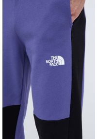 The North Face spodnie dresowe bawełniane kolor fioletowy wzorzyste. Kolor: fioletowy. Materiał: bawełna, dresówka #3