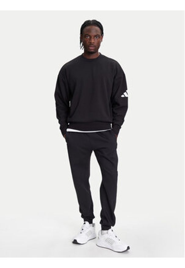 Adidas - adidas Bluza Essentials JF3542 Czarny Loose Fit. Kolor: czarny. Materiał: bawełna, syntetyk