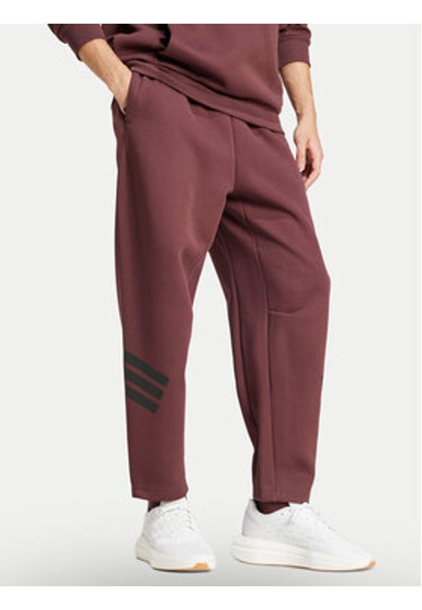 Adidas - adidas Spodnie dresowe Future Icons 3-Stripes JD4888 Bordowy Loose Fit. Kolor: czerwony. Materiał: bawełna