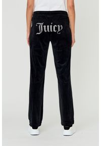 Juicy Couture - JUICY COUTURE Czarne spodnie Tina. Kolor: czarny. Materiał: poliester. Wzór: aplikacja