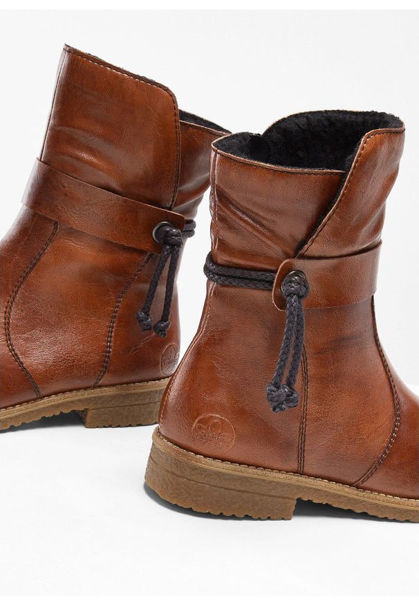 bonprix - Botki marki Rieker. Kolor: brązowy. Sezon: zima