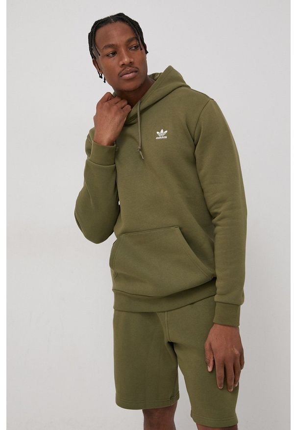 adidas Originals Bluza męska kolor zielony z kapturem gładka. Typ kołnierza: kaptur. Kolor: zielony. Materiał: materiał. Wzór: gładki