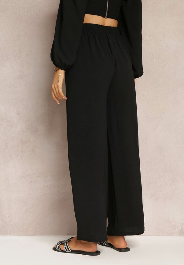 Renee - Czarne Spodnie z Szerokimi Nogawkami i Doszytym Paskiem w Talii Atita. Kolor: czarny