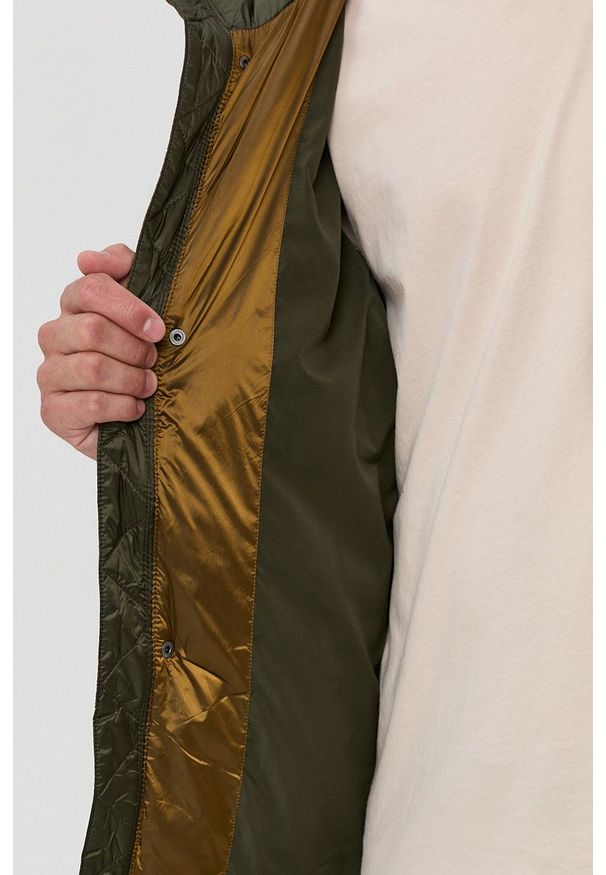 Tommy Jeans Kurtka puchowa męska kolor żółty zimowa. Okazja: na co dzień. Kolor: żółty. Materiał: puch. Wzór: gładki. Sezon: zima. Styl: casual