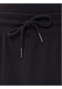 TOMMY HILFIGER - Tommy Hilfiger Spodnie dresowe UM0UM03664 Czarny Regular Fit. Kolor: czarny. Materiał: bawełna #4