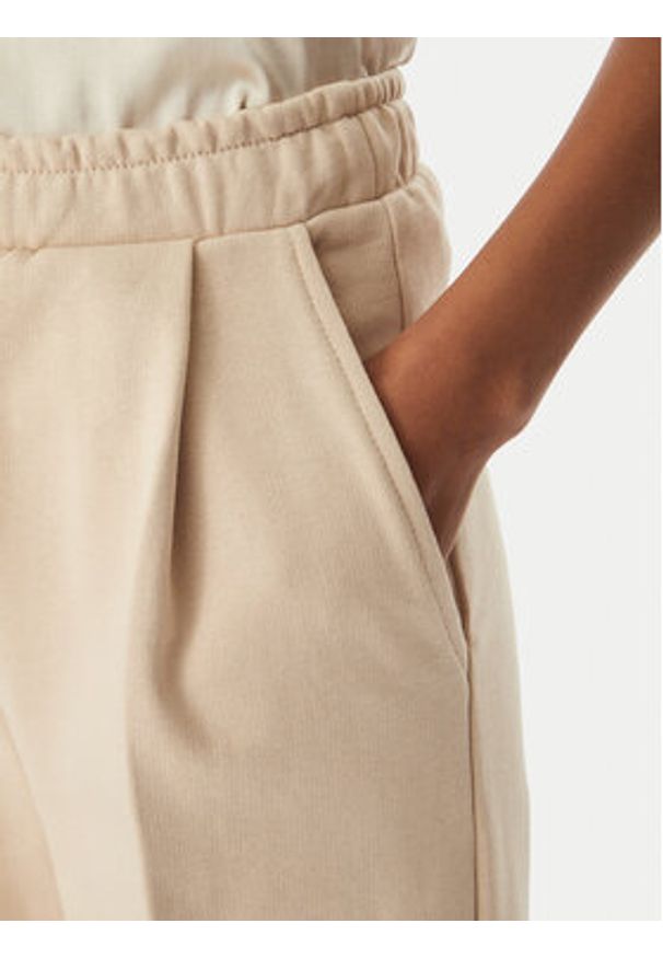 Maryley Spodnie materiałowe 26EB519/07BE Beżowy Reglan Fit. Kolor: beżowy. Materiał: bawełna
