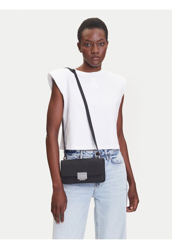 Tommy Jeans Torebka Tjw Fashionista Crossover AW0AW17306 Czarny. Kolor: czarny. Materiał: skórzane