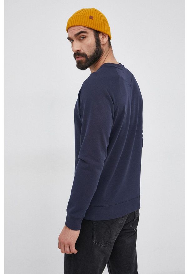 Scotch & Soda Bluza męska kolor granatowy z aplikacją. Okazja: na co dzień. Kolor: niebieski. Materiał: dzianina. Długość rękawa: raglanowy rękaw. Wzór: aplikacja. Styl: casual