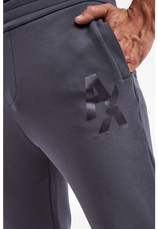 Armani Exchange - Spodnie dresowe ARMANI EXCHANGE. Materiał: dresówka. Wzór: aplikacja