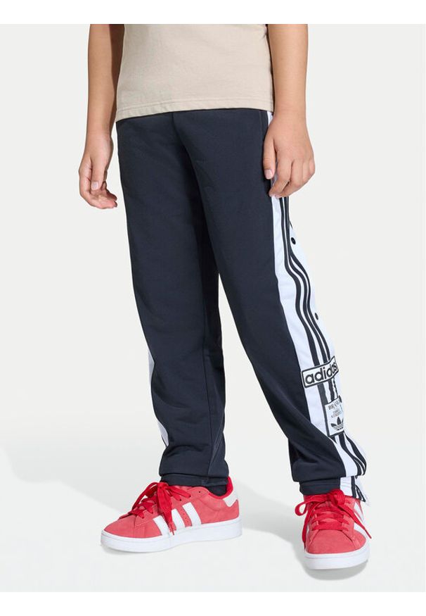 Adidas - adidas Spodnie dresowe Adibreak KD3989 Czarny Regular Fit. Kolor: czarny. Materiał: syntetyk