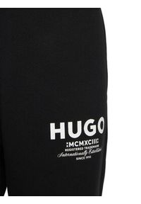 Hugo - HUGO Spodnie dresowe Nevez 50510734 Czarny Loose Fit. Kolor: czarny. Materiał: bawełna #2