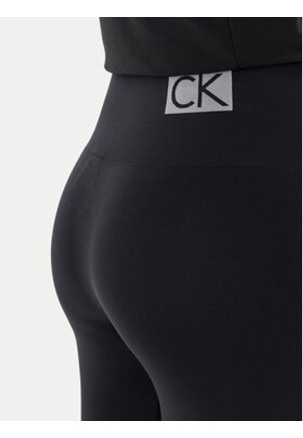 Calvin Klein Legginsy 701233681 Czarny Slim Fit. Kolor: czarny. Materiał: syntetyk