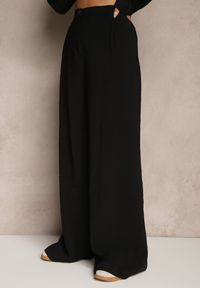 Renee - Czarne Spodnie Low Waist z Modalu z Szeroką Nogawką Reanelira. Okazja: na co dzień. Stan: obniżony. Kolor: czarny. Styl: klasyczny, elegancki, casual