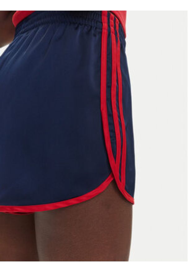 Adidas - adidas Szorty sportowe adicolor 3-Stripes Sprinter JZ3514 Granatowy Loose Fit. Kolor: niebieski. Materiał: syntetyk