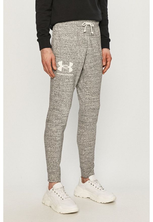 Under Armour - Spodnie. Kolor: szary. Materiał: dzianina