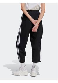 Adidas - adidas Spodnie dresowe Essentials 3-Stripes Open Hem Fleece HZ5748 Czarny Loose Fit. Kolor: czarny. Materiał: bawełna #4