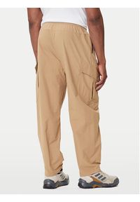Adidas - adidas Spodnie outdoor Terrex Xploric JM7424 Beżowy Loose Fit. Kolor: beżowy. Materiał: syntetyk. Sport: outdoor #4