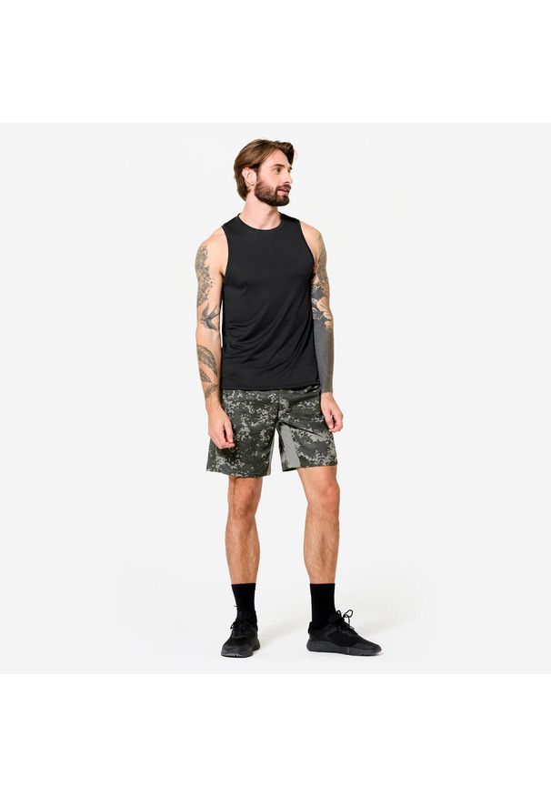 DOMYOS - Koszulka fitness męska Domyos bez rękawów. Kolor: czarny. Materiał: poliester, materiał. Długość rękawa: bez rękawów. Styl: sportowy