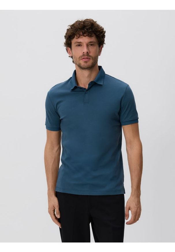 Reserved - Polo slim z bawełny pima - granatowy. Typ kołnierza: polo. Kolor: niebieski. Materiał: bawełna