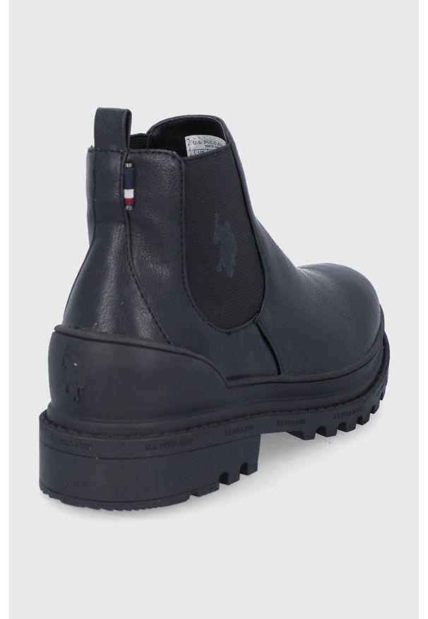 U.S. Polo Assn. Sztyblety Bruna damskie kolor czarny na płaskim obcasie. Nosek buta: okrągły. Kolor: czarny. Materiał: guma. Obcas: na obcasie. Wysokość obcasa: niski