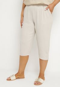 Born2be - Beżowe Spodnie z Gumką w Pasie 7/8 Tenimira. Okazja: na co dzień, na spacer. Kolekcja: plus size. Kolor: beżowy. Styl: klasyczny, elegancki, casual