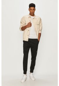 Calvin Klein Jeans - Spodnie. Kolor: czarny. Materiał: poliester, wiskoza, dzianina, elastan. Wzór: gładki #2
