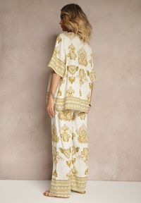 Renee - Żółty Wiskozowy Komplet w Orientalny Print Szerokie Spodnie i T-shirt Pollialia. Kolor: żółty. Materiał: wiskoza. Wzór: nadruk