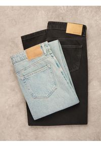 Reserved - Jeansy baggy tapered - czarny. Kolor: czarny