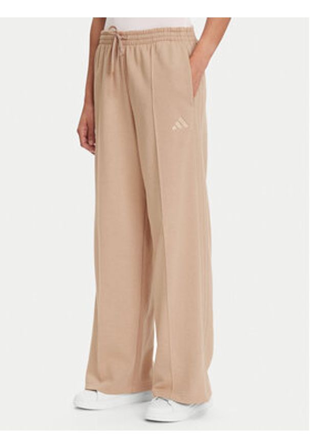 Adidas - adidas Dres Energize JX0532 Beżowy Regular Fit. Kolor: beżowy. Materiał: bawełna, syntetyk