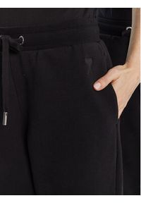 AMI PARIS Spodnie dresowe UTR240.747 Czarny Regular Fit. Kolor: czarny. Materiał: bawełna #4