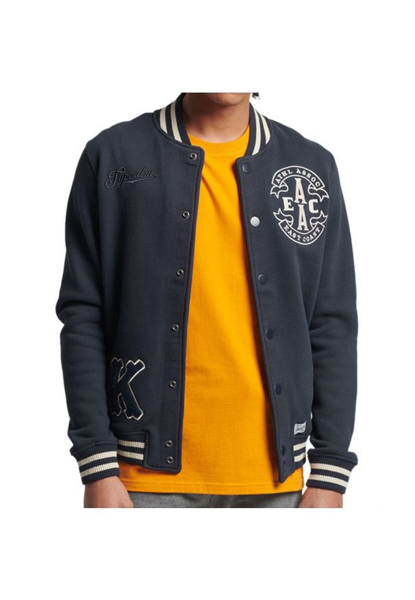 Kurtka turystyczna męska Superdry Collegiate Jersey. Kolor: czarny, biały, wielokolorowy. Materiał: poliester, bawełna. Sezon: zima, jesień. Sport: turystyka piesza