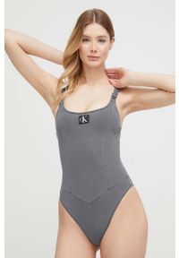 Calvin Klein jednoczęściowy strój kąpielowy kolor czarny lekko usztywniona miseczka. Kolor: szary. Materiał: materiał