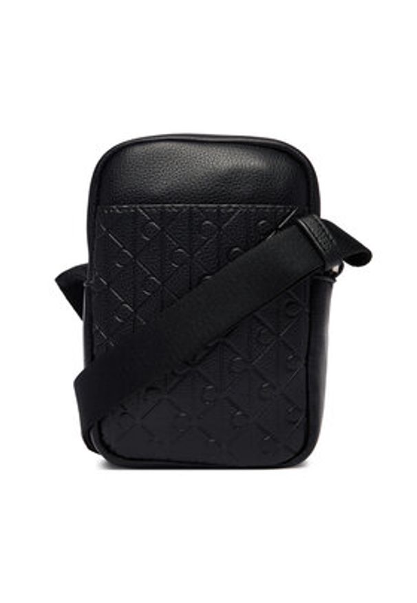 Calvin Klein Saszetka Emblem Aop Emboss Slim Reporter LV04D3228G Czarny. Kolor: czarny. Materiał: skóra