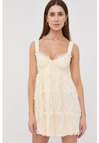 For Love & Lemons sukienka kolor beżowy mini rozkloszowana. Kolor: beżowy. Typ sukienki: rozkloszowane. Długość: mini