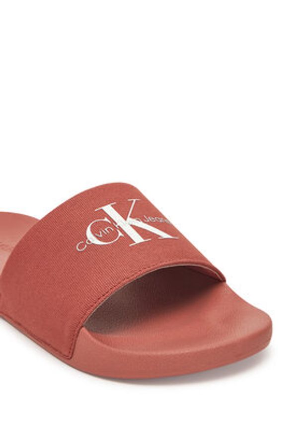 Calvin Klein Jeans Klapki Slide Monogram Cv YM0YM01271 Koralowy. Kolor: pomarańczowy. Materiał: materiał