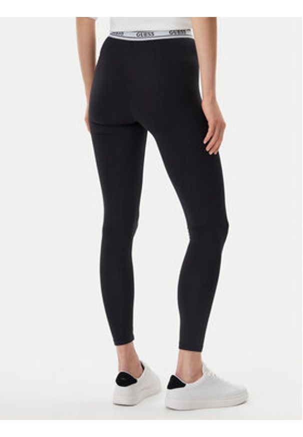 Guess Legginsy V5GB04 KCSA2 Czarny. Kolor: czarny. Materiał: bawełna, syntetyk