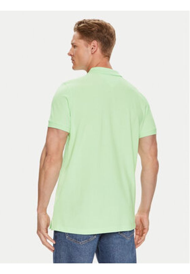 Tommy Jeans Polo DM0DM18312 Zielony Slim Fit. Typ kołnierza: polo. Kolor: zielony. Materiał: bawełna