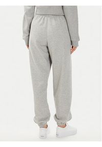 Adidas - adidas Spodnie dresowe Essentials Fleece IA6432 Szary Regular Fit. Kolor: szary. Materiał: bawełna #5